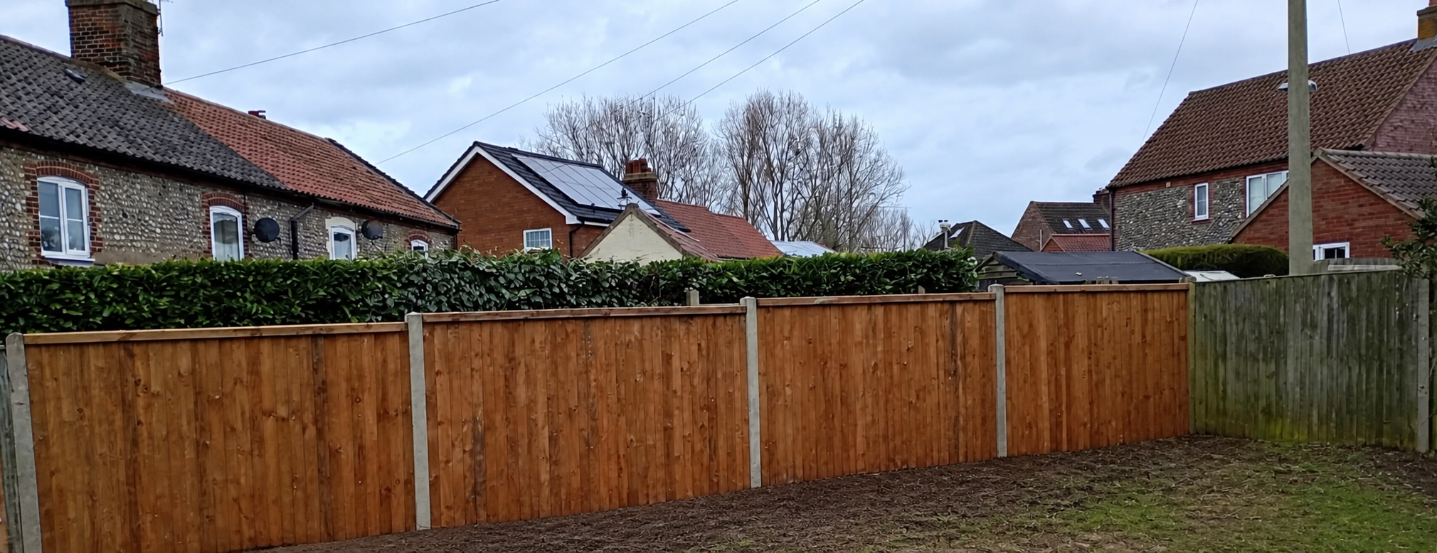 New timber panel fencing with concrete posts